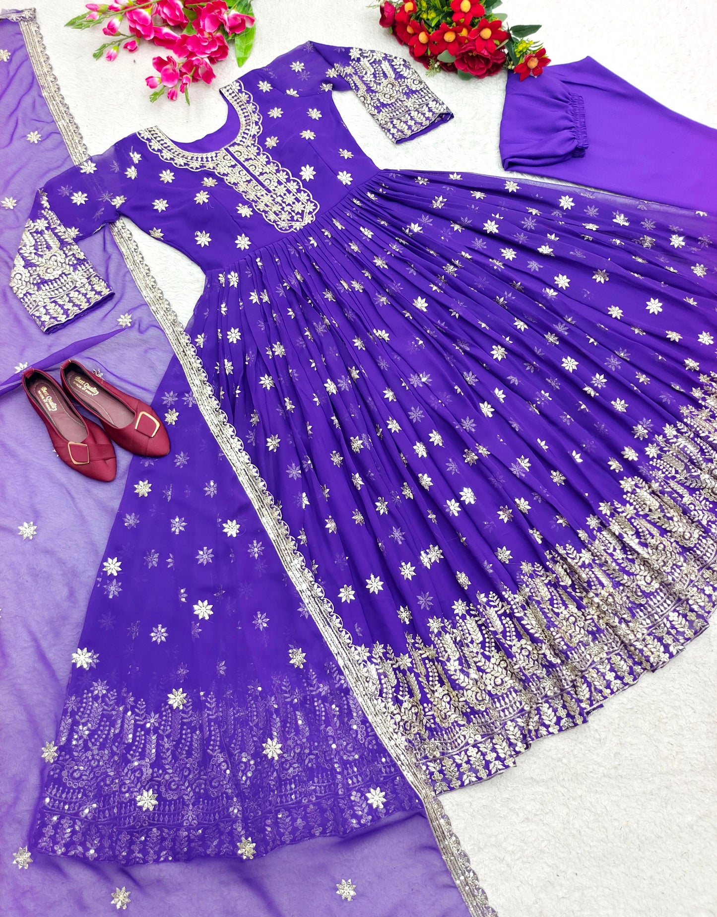 Eyes Catching Purple Color Embroidery Work Gown