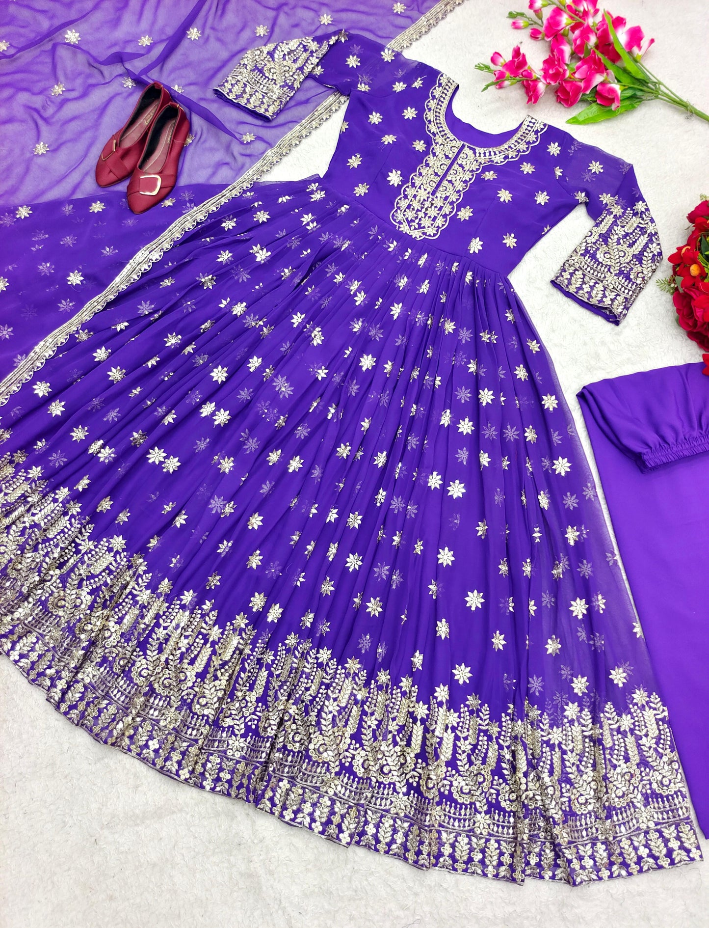 Eyes Catching Purple Color Embroidery Work Gown