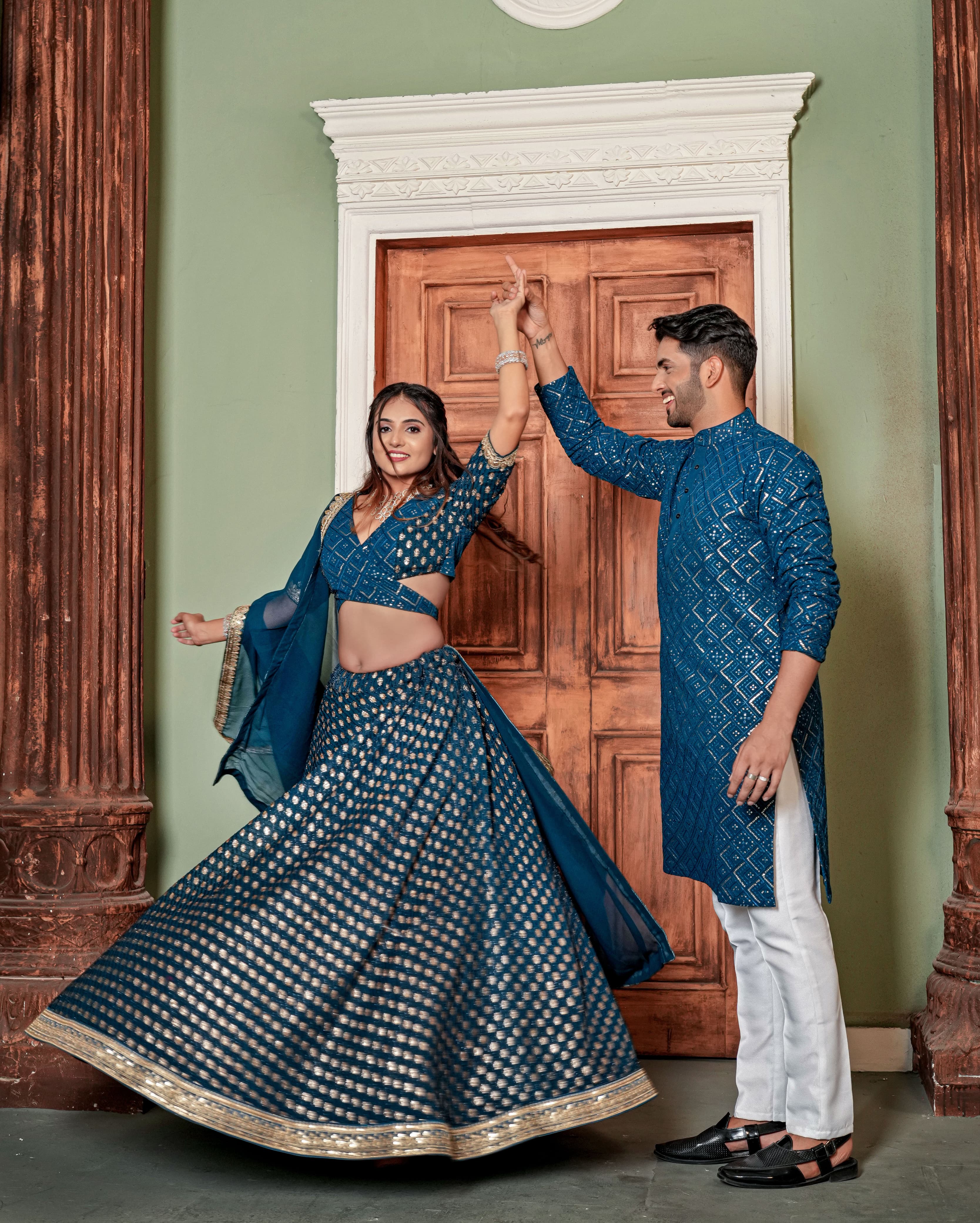 Luxuriant Teal Blue Color Zari Sequence Work Couple Dress