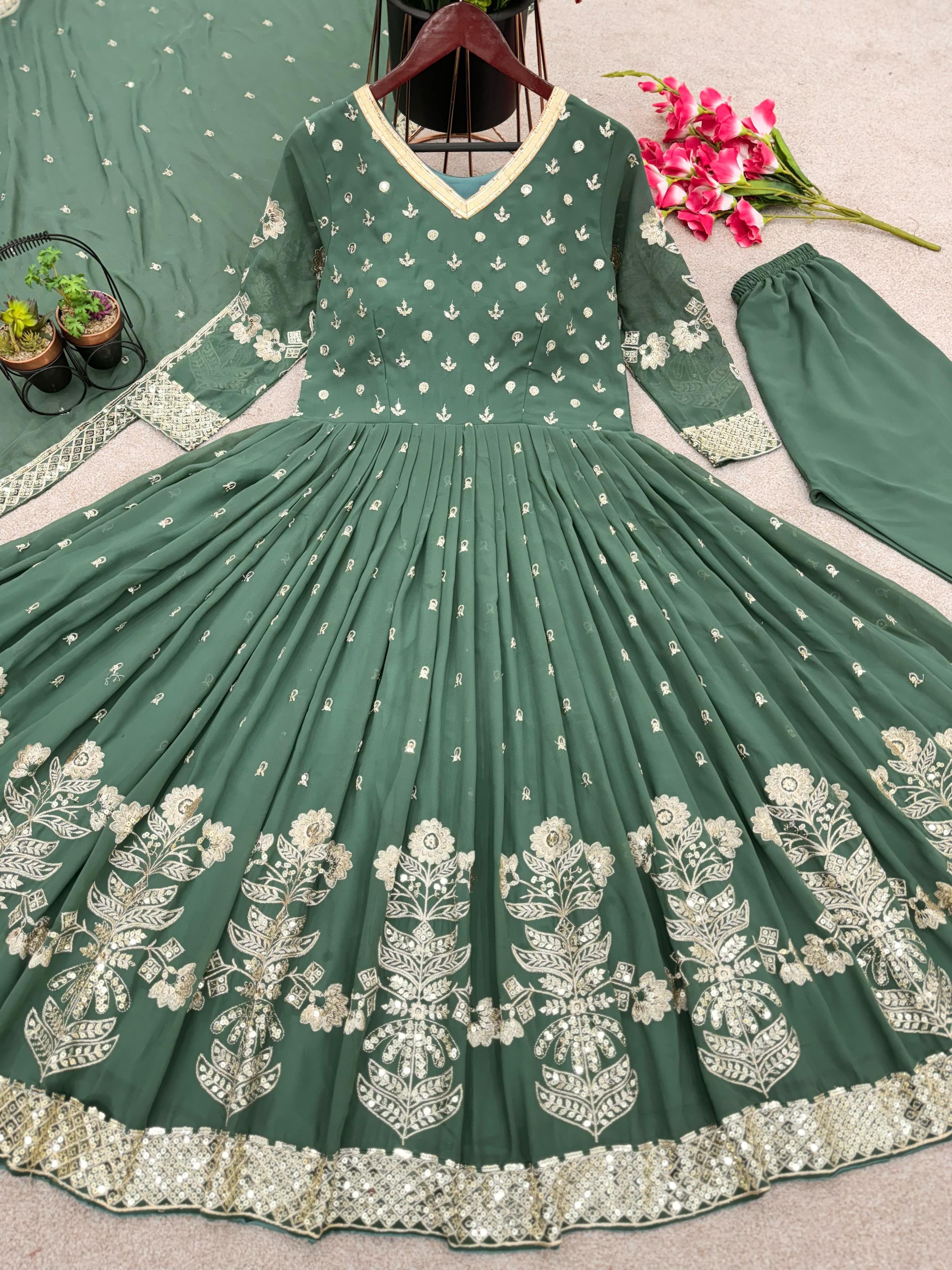 Superhit Pista Green Color Embroidery Work Gown