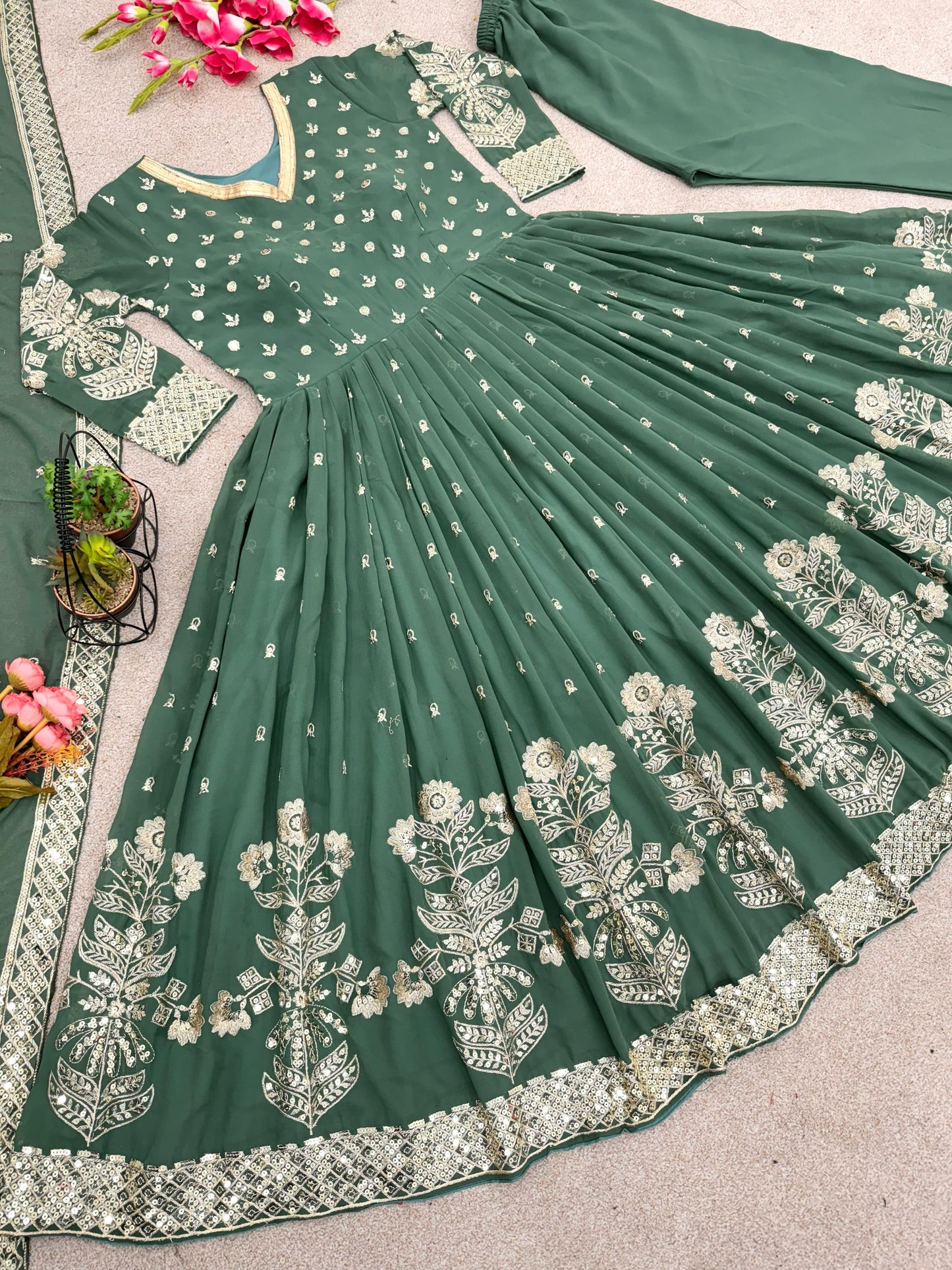 Superhit Pista Green Color Embroidery Work Gown