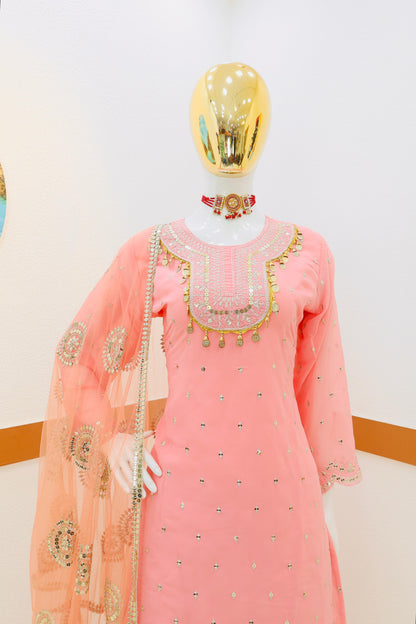 Glorious Peach Color Sharara Suit With Net Dupatta