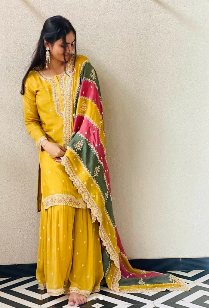 Embroidery Work Yellow Sharara Suit With Multi Color Dupatta