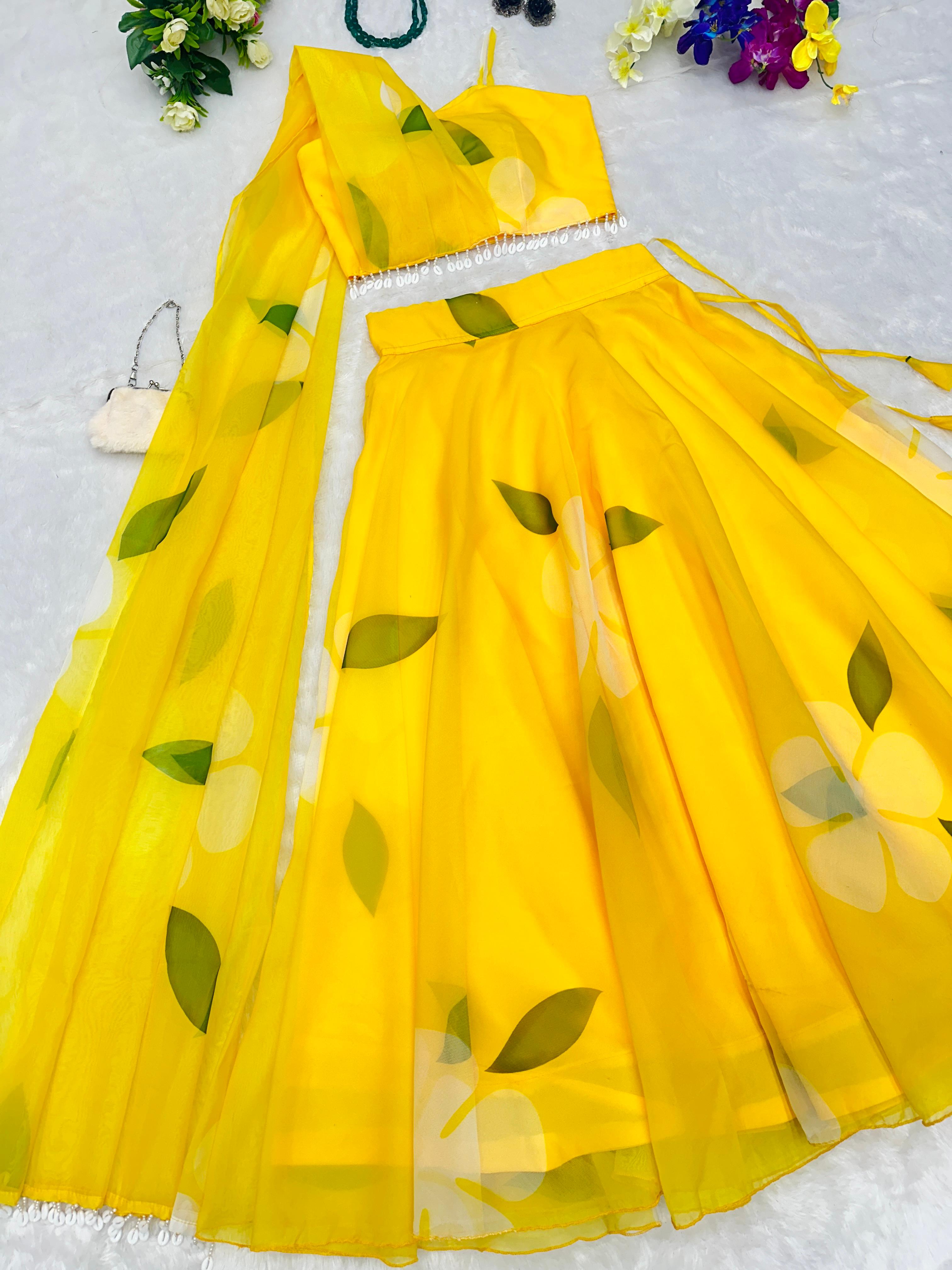 Organza Yellow Color Lehenga And Blouse With Attached Dupatta