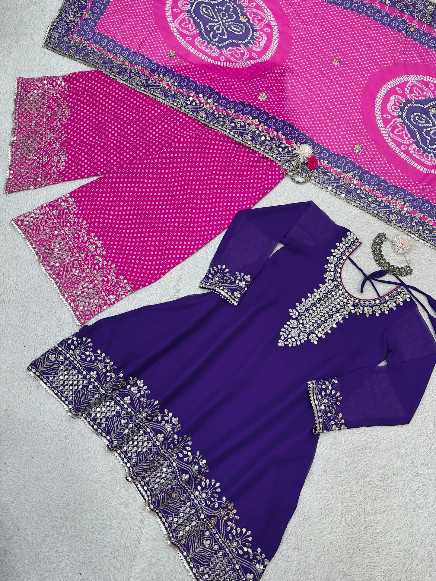 Festive Wear Purple Top With Bandhani Printed Pink Sharara Suit