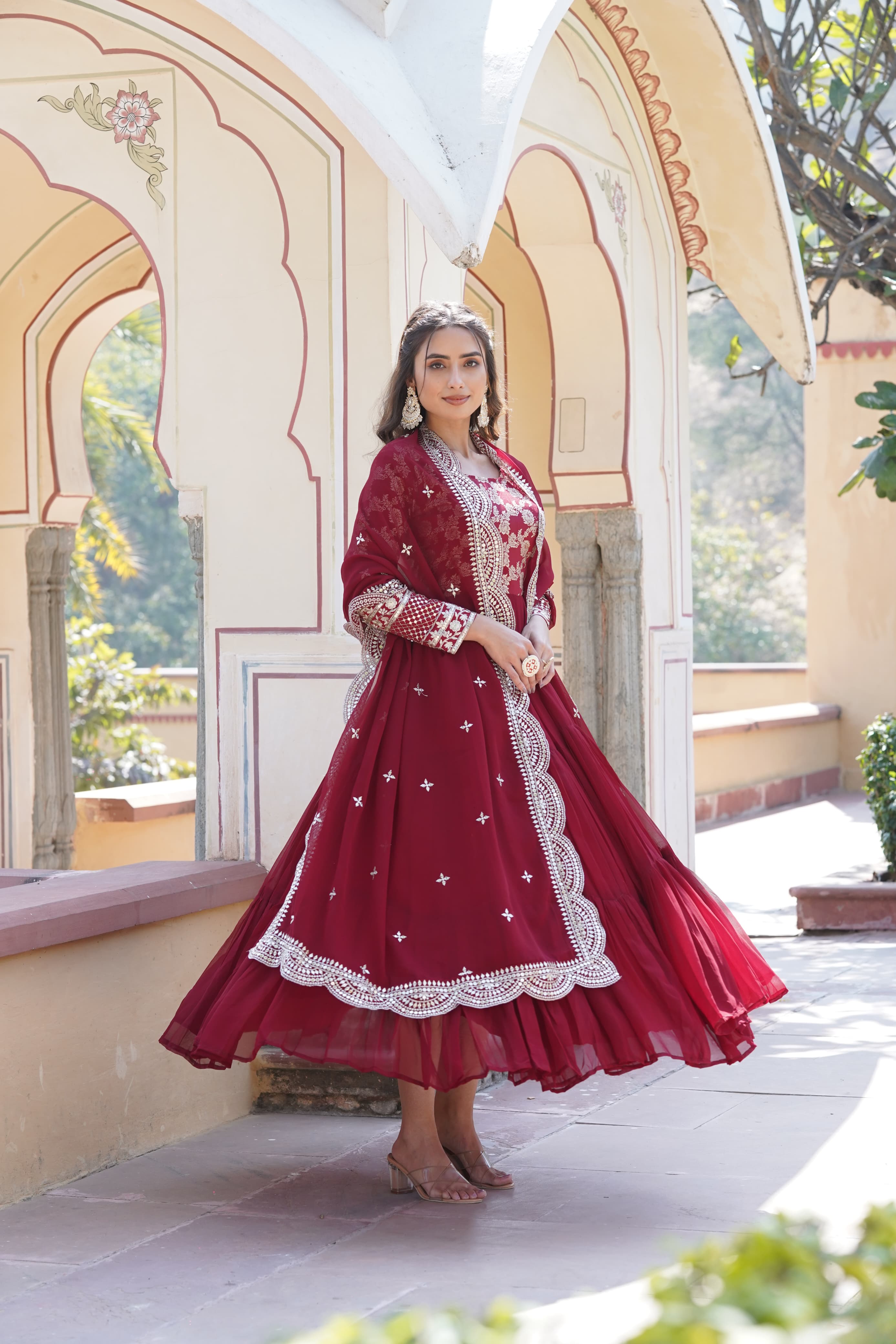 Innovative Maroon Color Jacquard Embroidered Work Gown