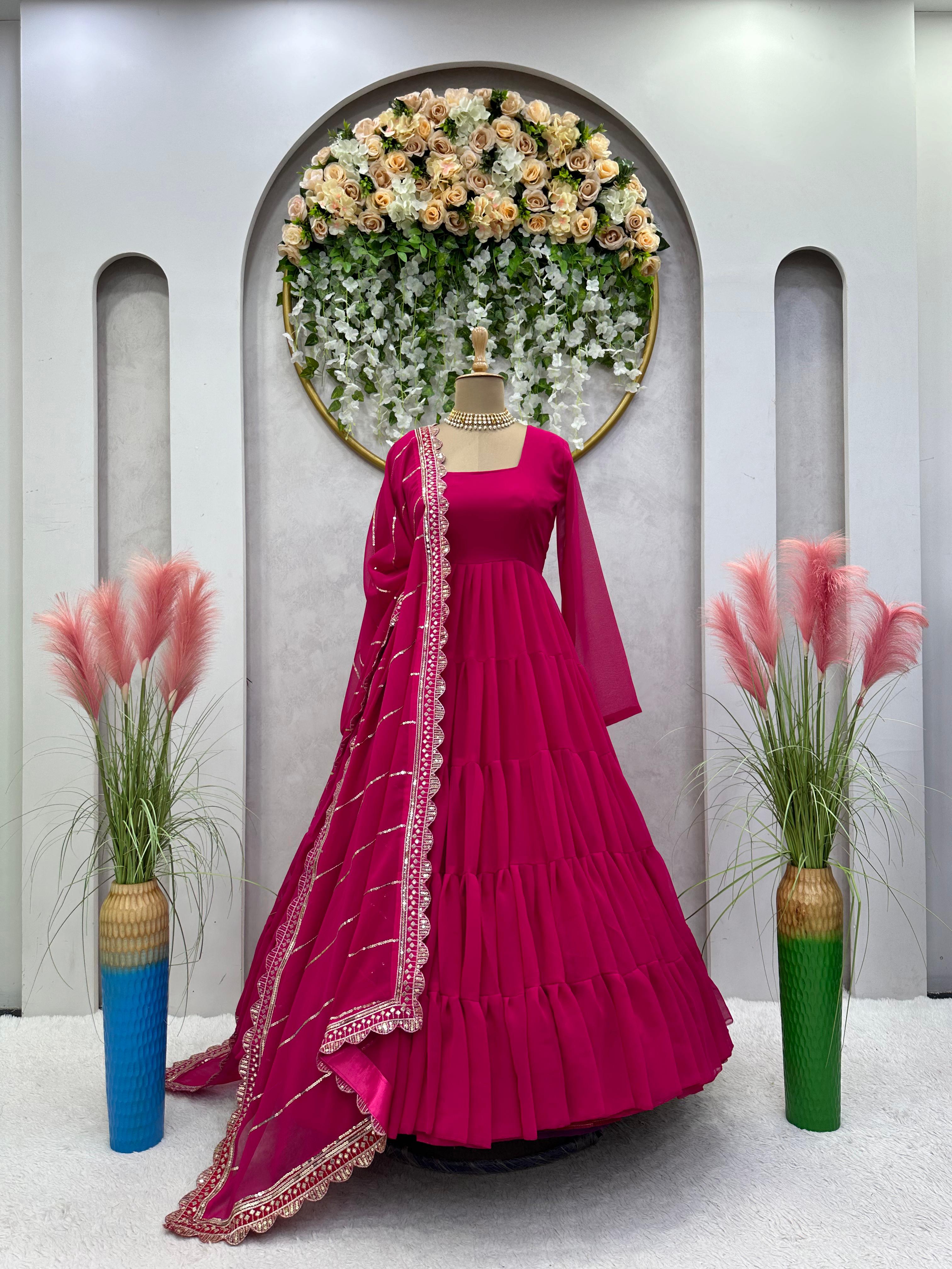 Adorable Ruffle Style Pink Long Gown With Work Dupatta