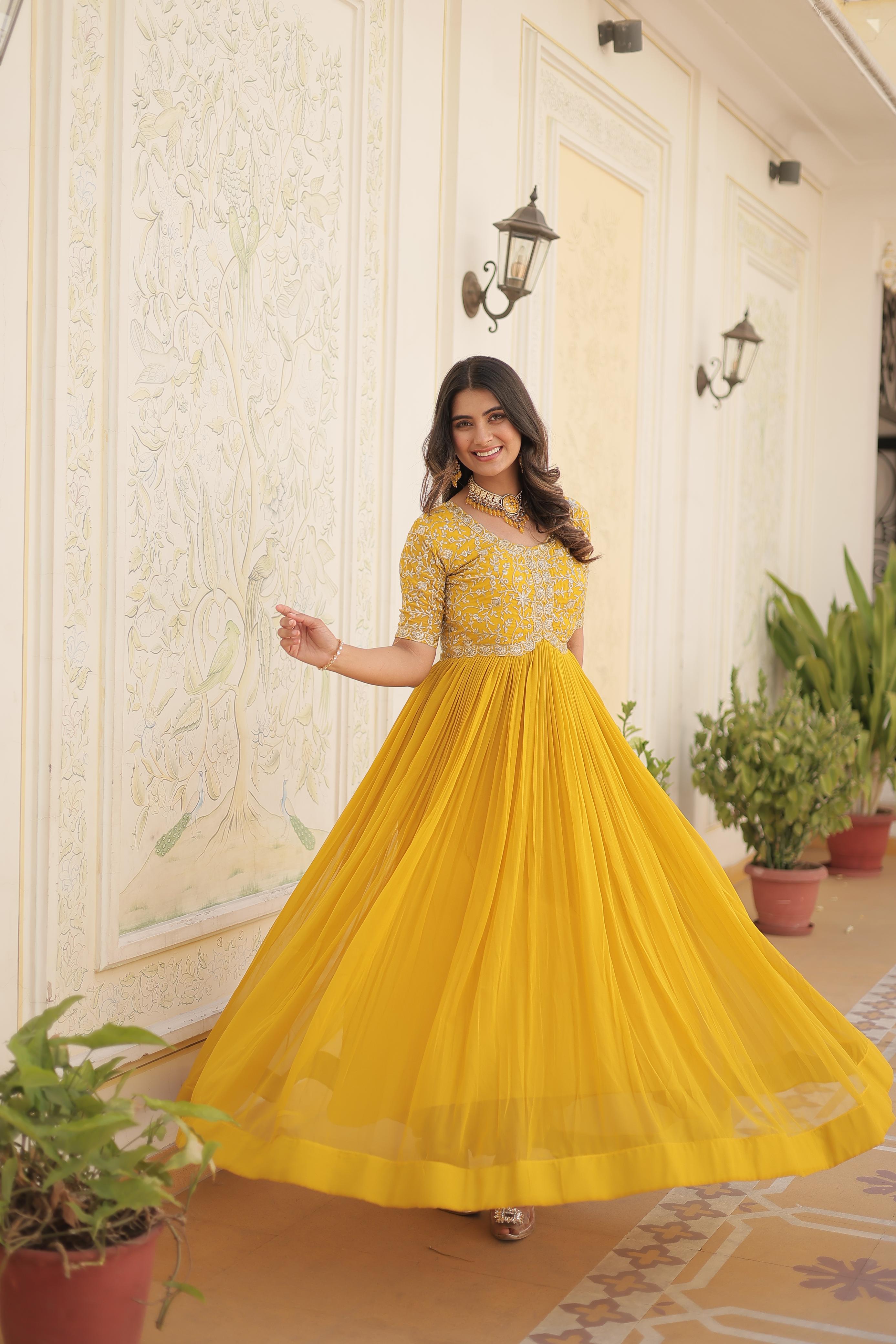 Terrific Yellow Color Embroidery Work Gown