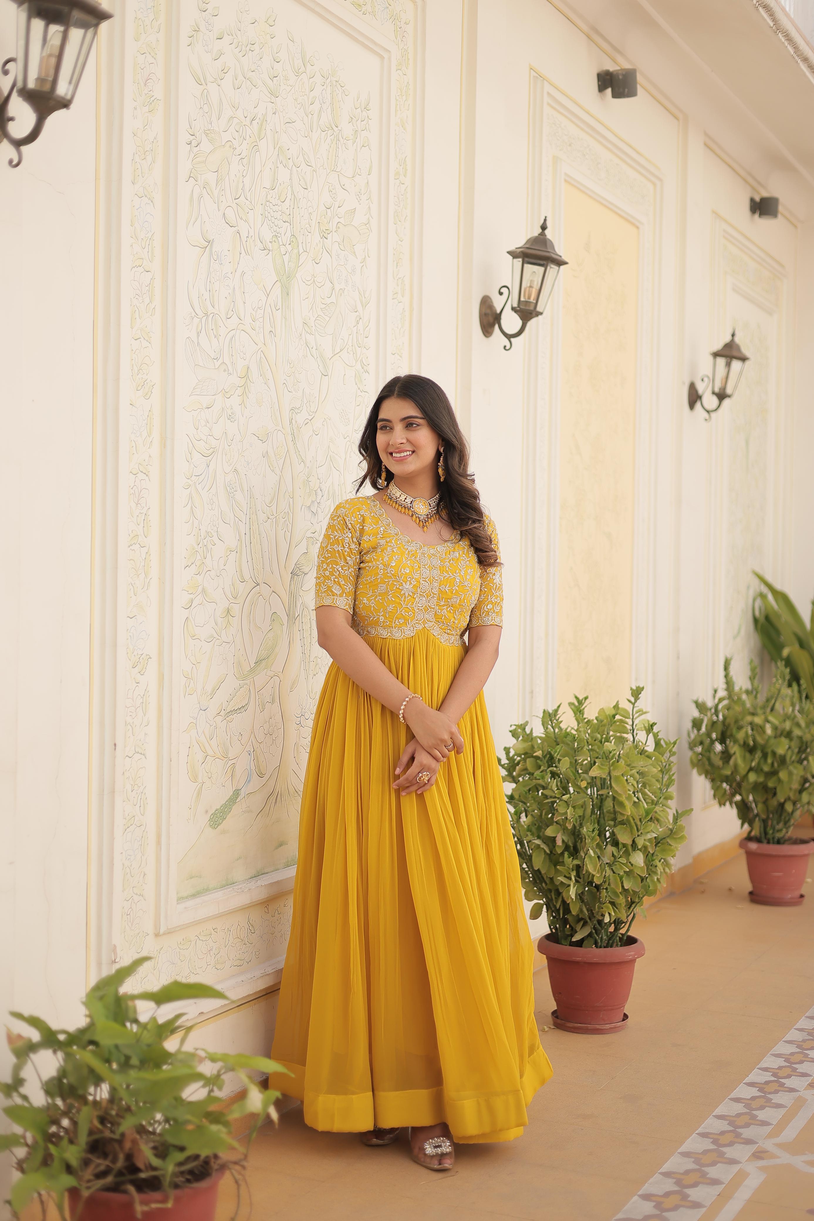 Terrific Yellow Color Embroidery Work Gown