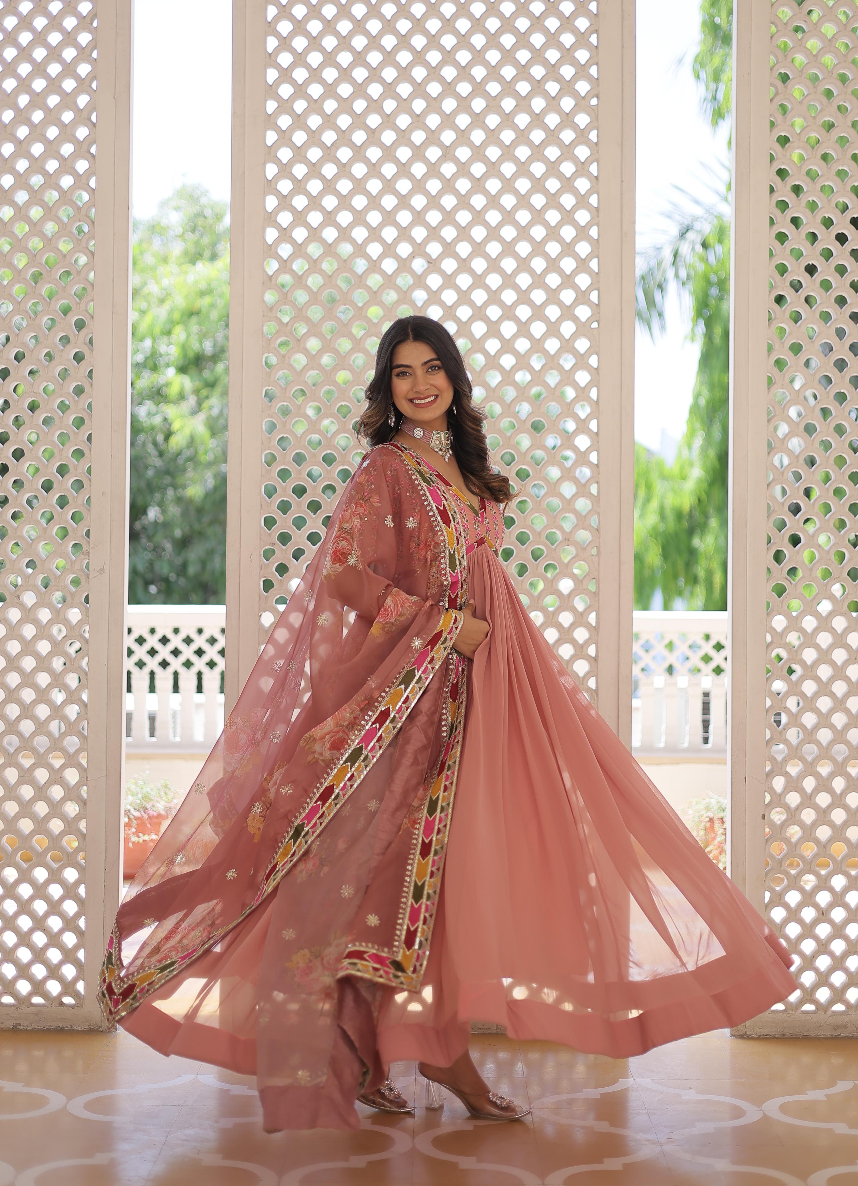 Sequence Zari Work Peach Color Imposing Long Gown