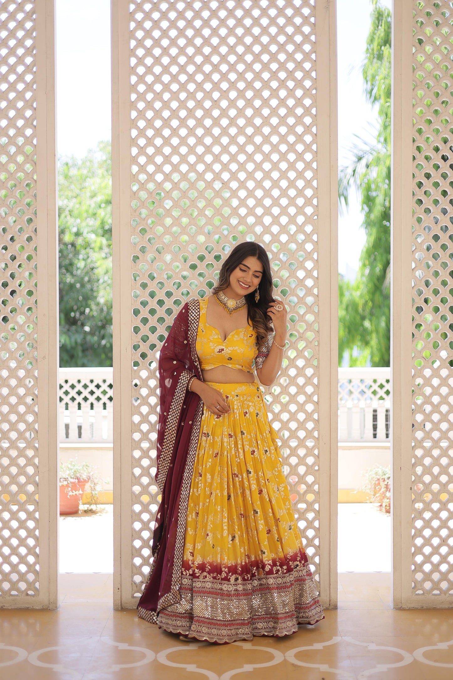 Captivating Jacquard Yellow White Lehenga Choli