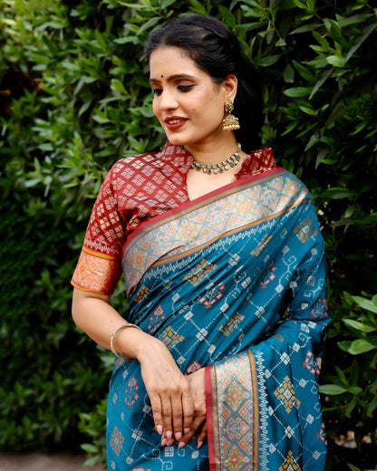 Beautiful Kanchi Border Blue Color Patola Silk Saree