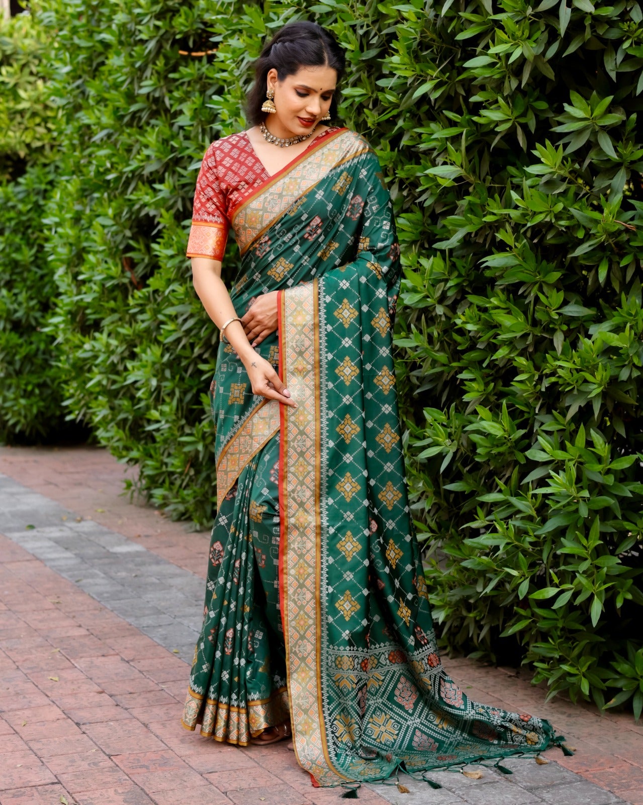 Beautiful Kanchi Border Green Color Patola Silk Saree