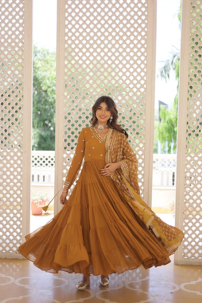 Ruffle Flair With Embroidery Work Mustard Color Gown