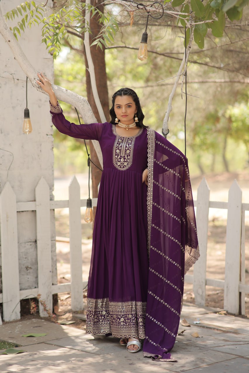 Presenting Embroidered Work Purple Color Gown