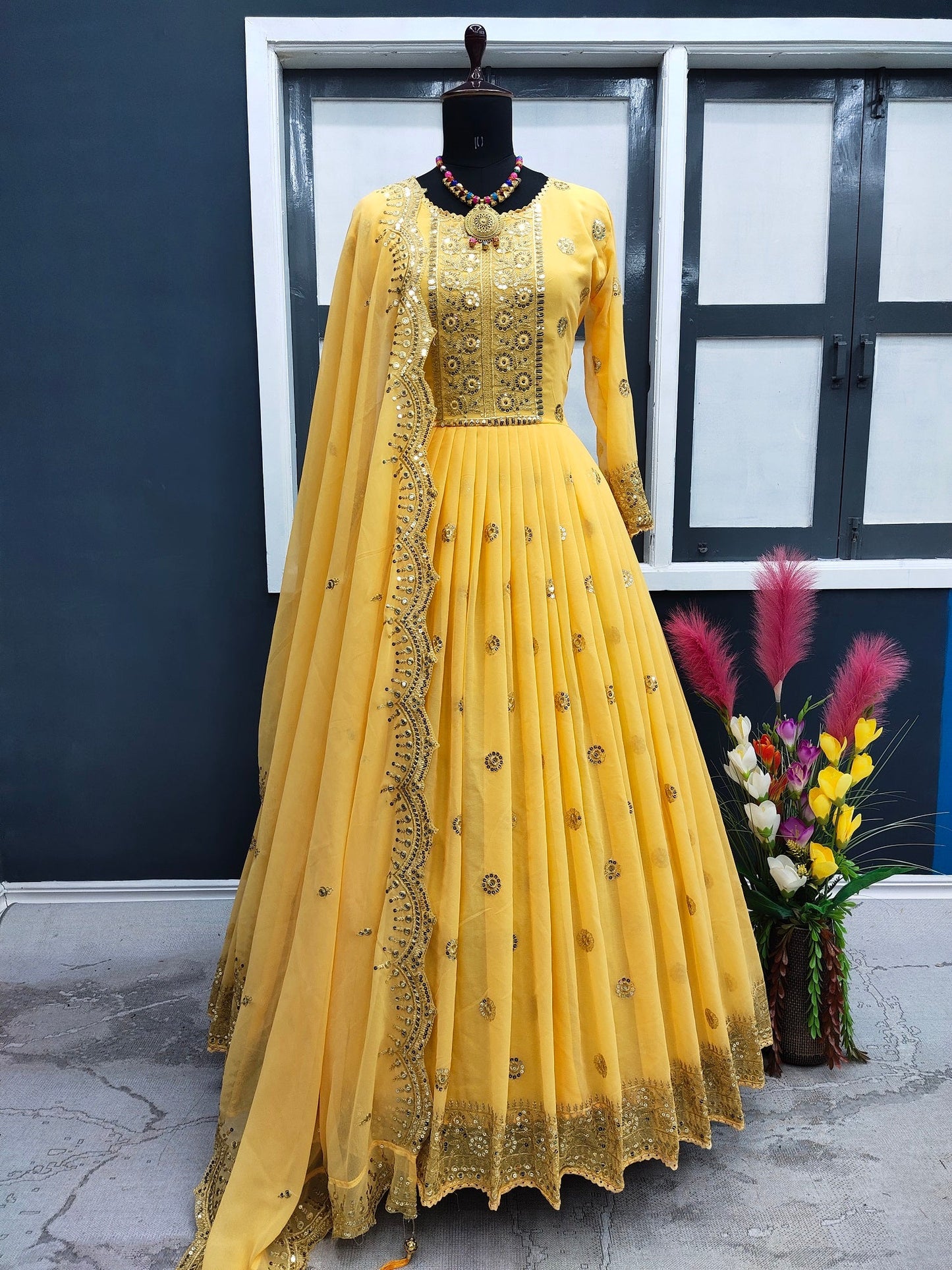 Yellow Color Embroidery Sequence Trendy Gown