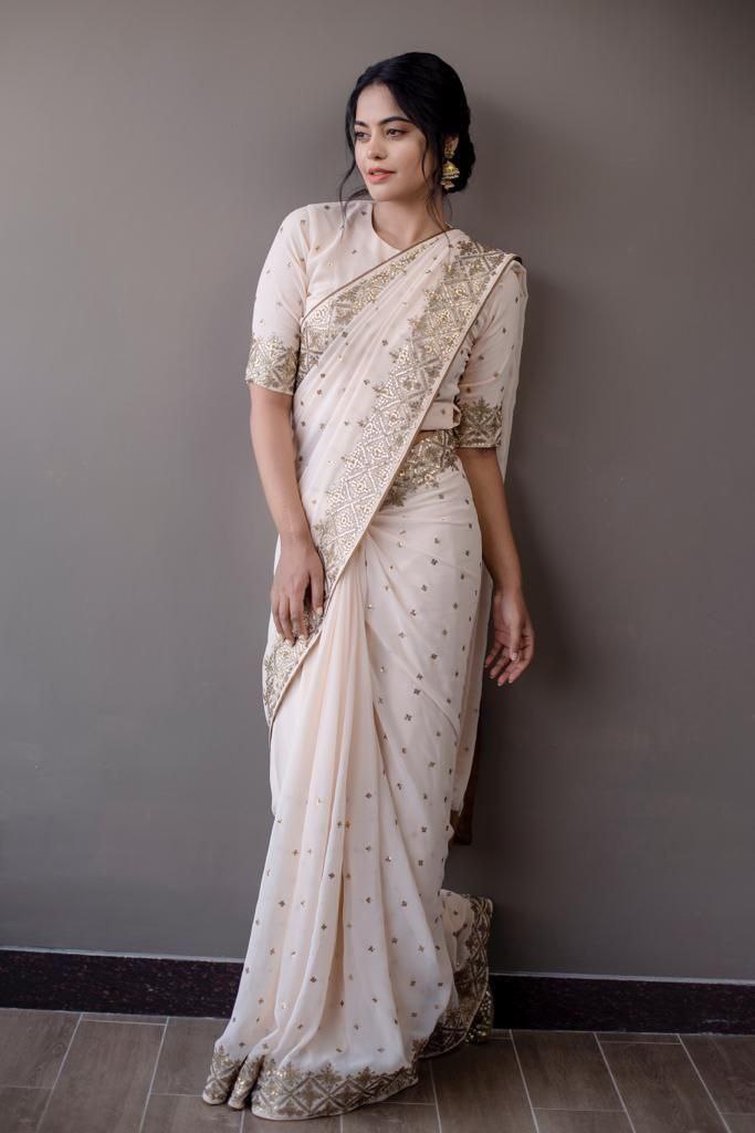 Presenting Multi Sequin Work White Color Saree