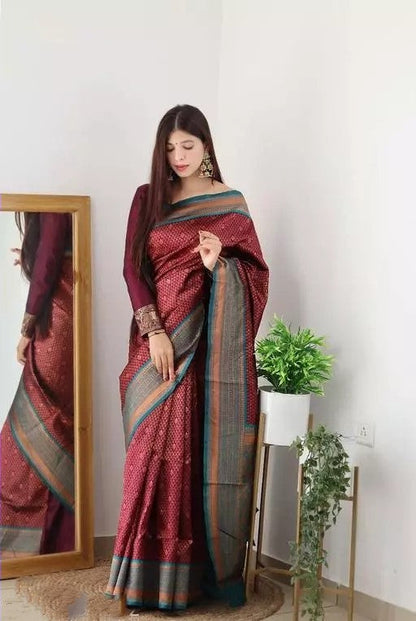 Gorgeous Maroon And Aqua Green Border Saree