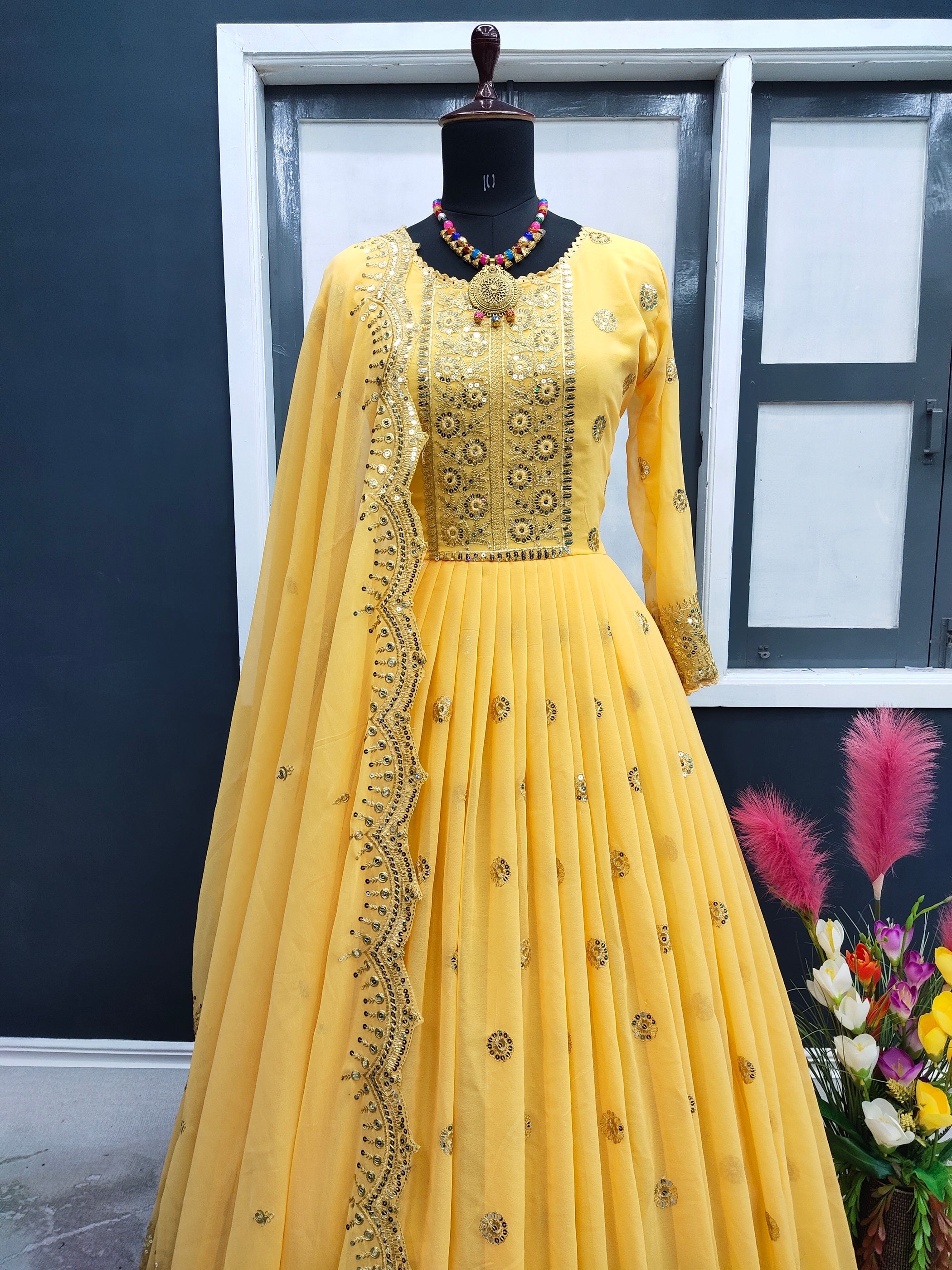 Yellow Color Embroidery Sequence Trendy Gown