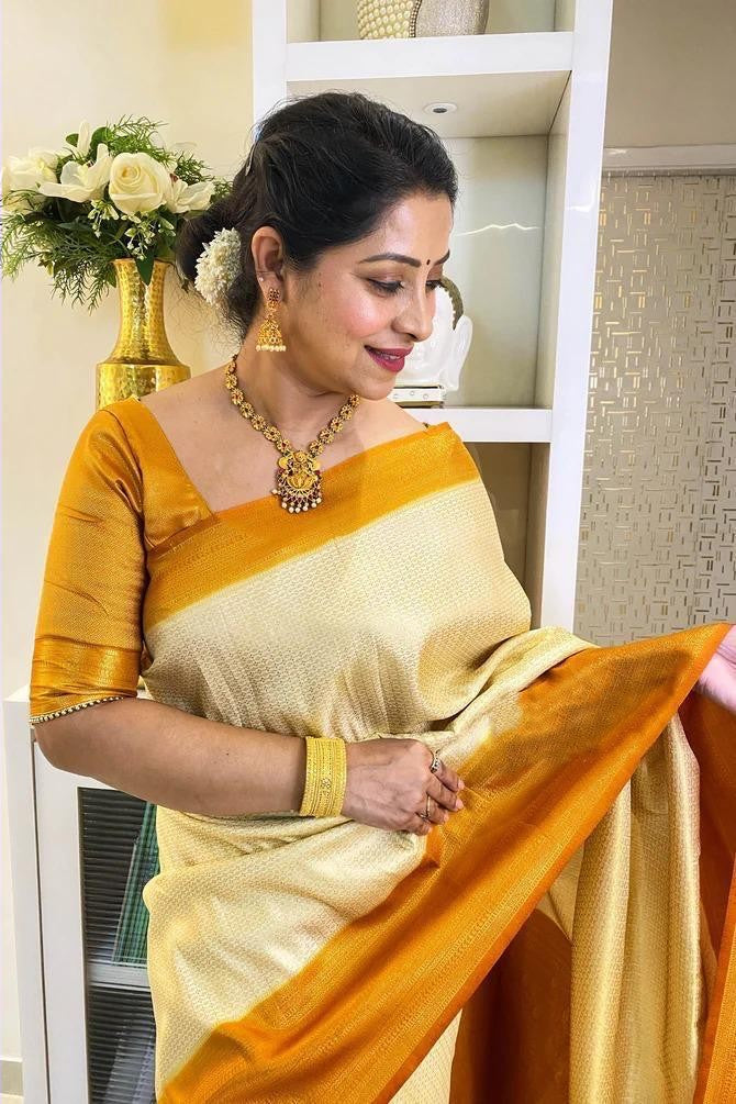 Wonderful Yellow And White Color Golden Jari Saree