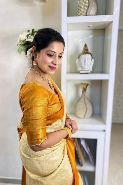 Wonderful Yellow And White Color Golden Jari Saree