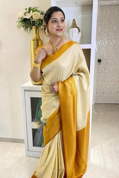 Wonderful Yellow And White Color Golden Jari Saree