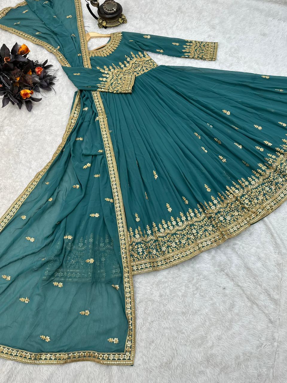 Mesmerizing Sequence Work Aqua Green Color Gown