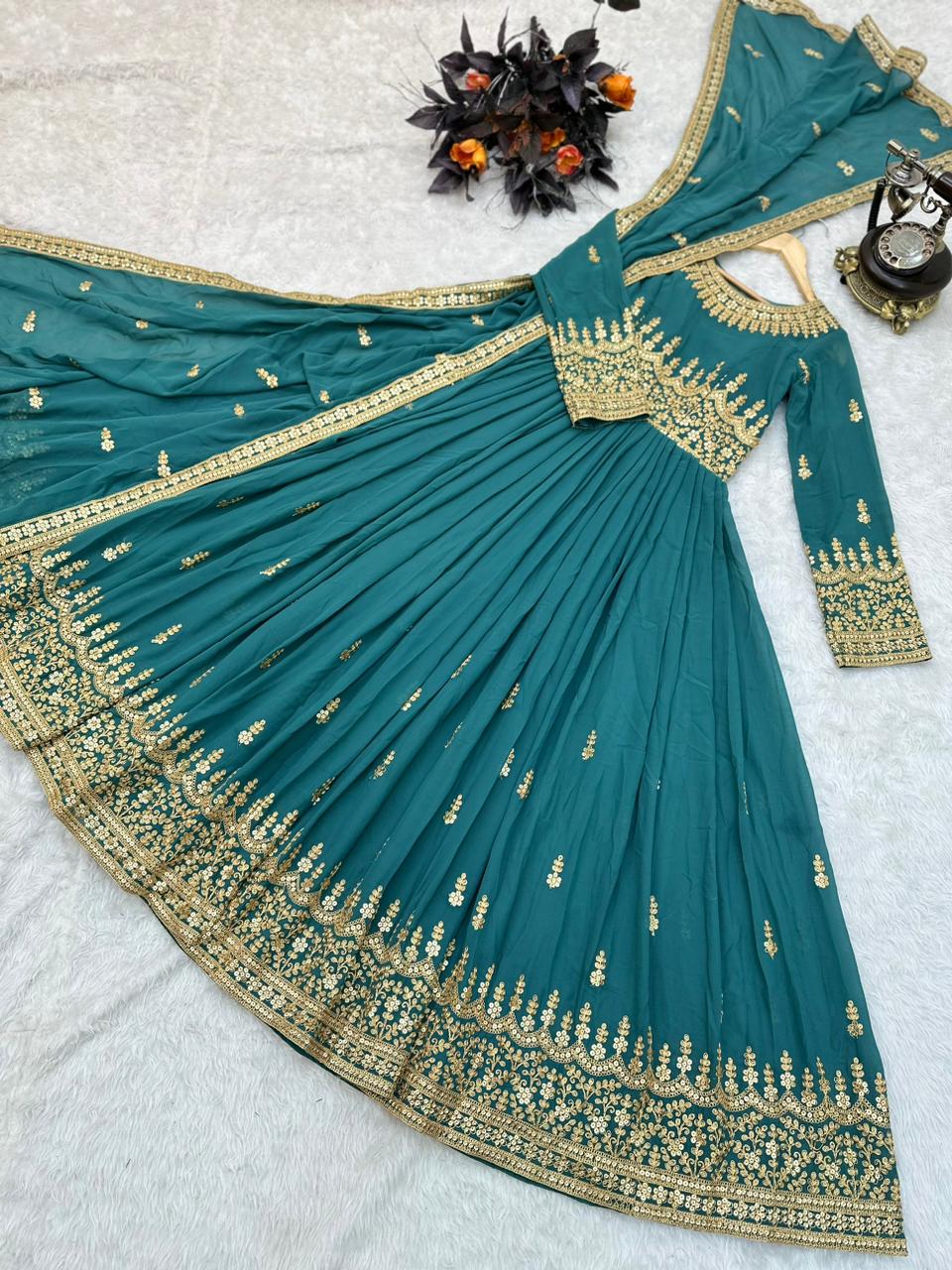 Mesmerizing Sequence Work Aqua Green Color Gown