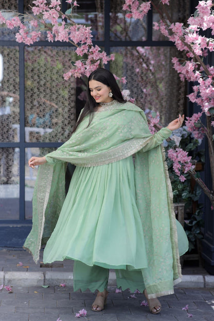 Lovely Pista Green Color Gown With Embroidered Work Dupatta