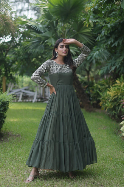 Fantastic Mehendi Green Color Zari Work Gown