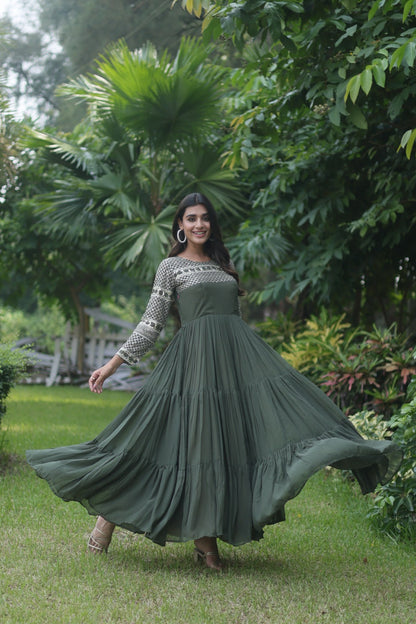 Fantastic Mehendi Green Color Zari Work Gown