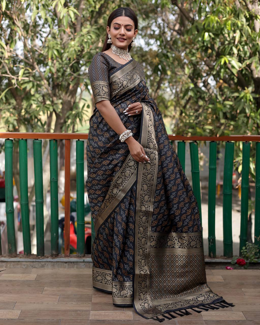 Traditional Patola Silk With Bandhani Designed Black Color Saree