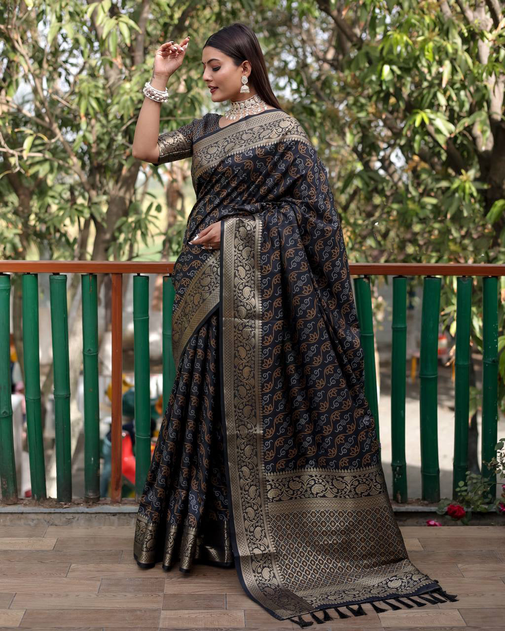 Traditional Patola Silk With Bandhani Designed Black Color Saree