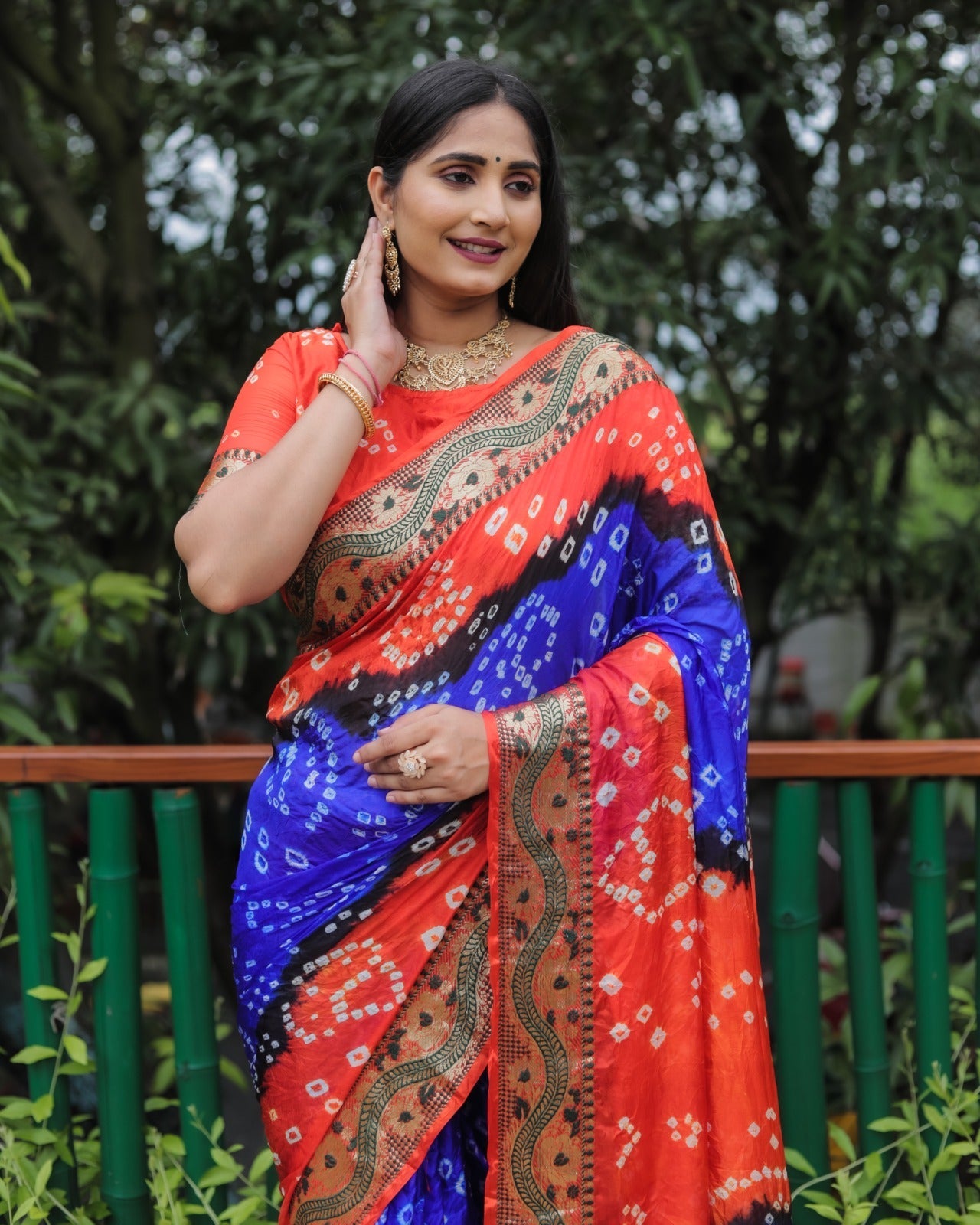 Blue And Orange Dual Color Bandhej Pallu Saree