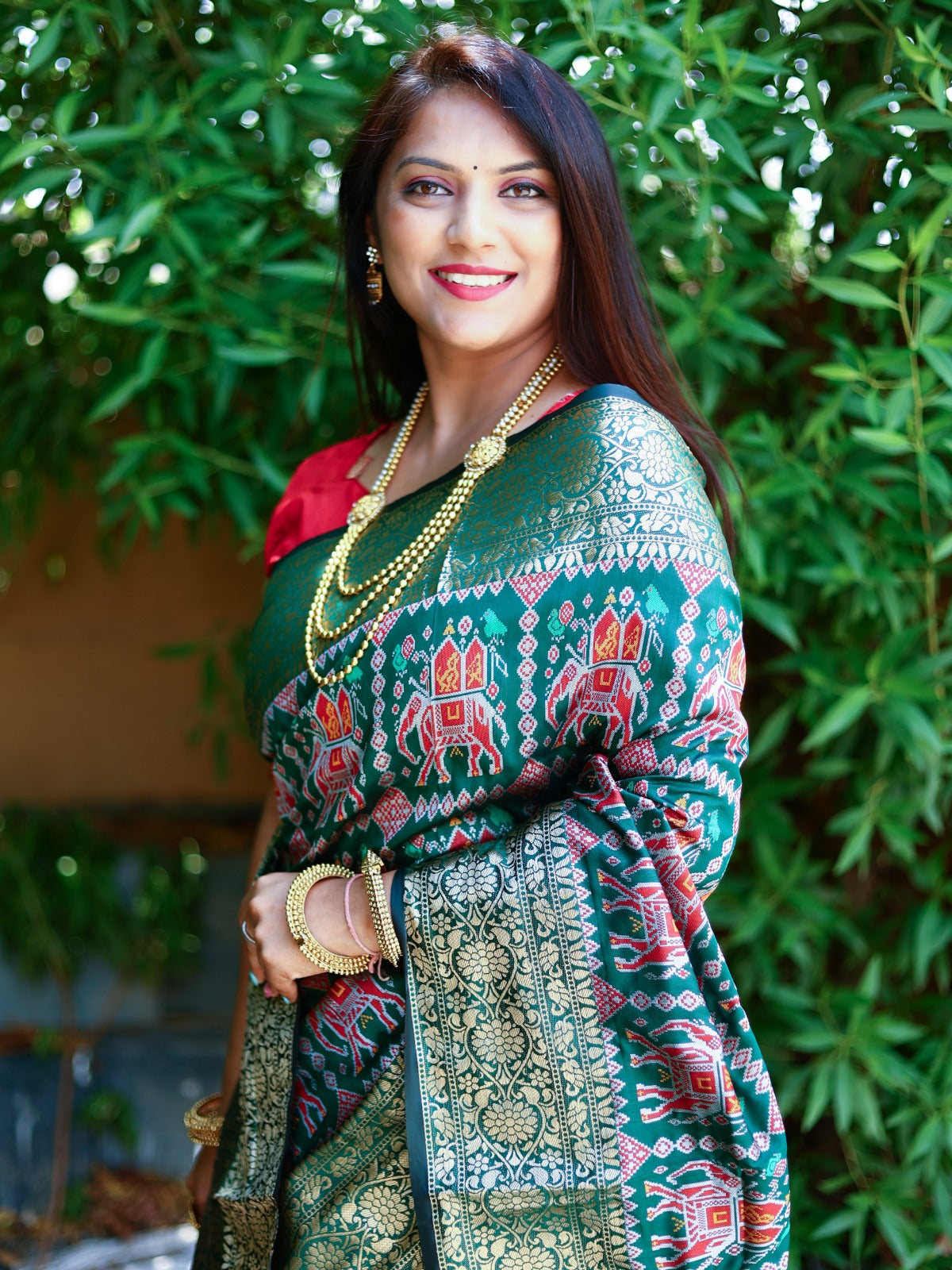 Green Color Patola Silk Saree wIth zari weaving Work