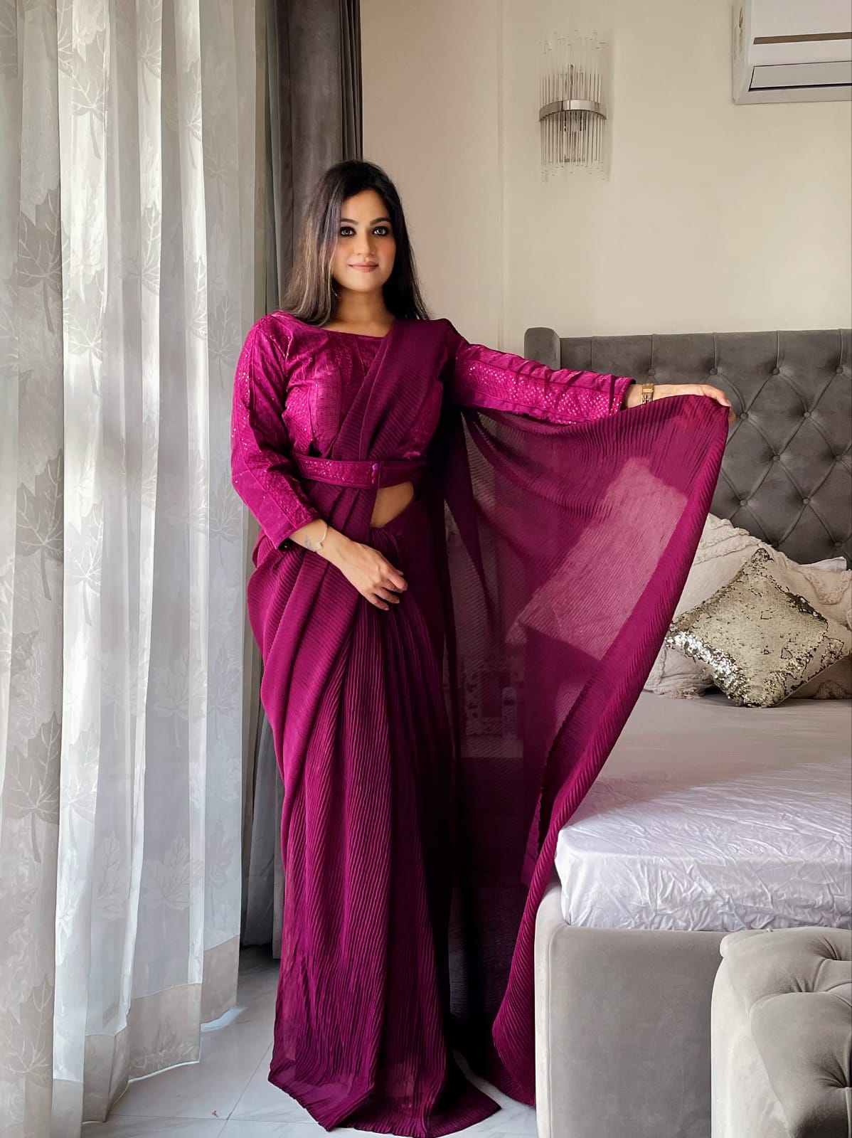 Wine Color Plated Saree And Attached Belt Blouse