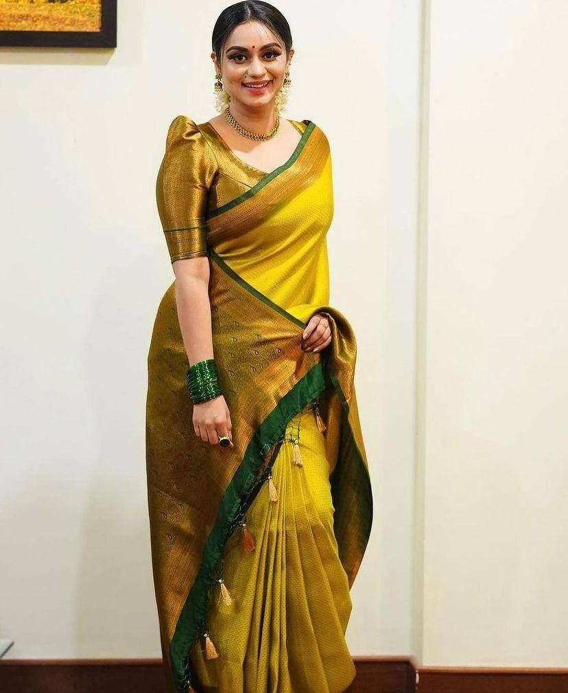 Flattering Coper Design Yellow Color Soft Silk Saree