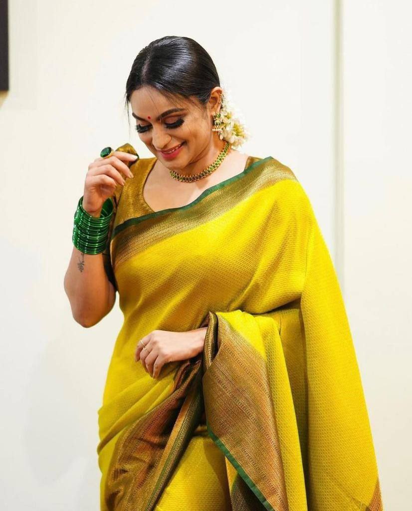 Flattering Coper Design Yellow Color Soft Silk Saree