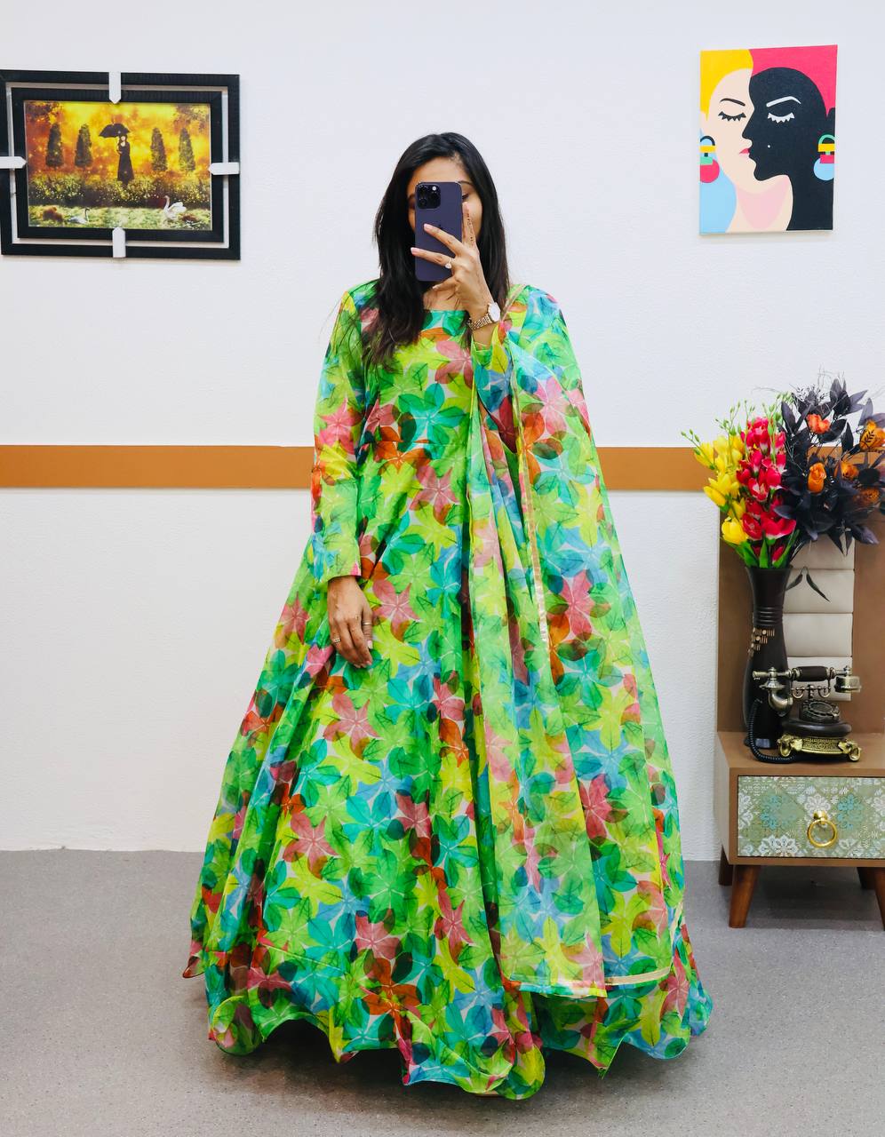 Attractive Parrot Green Color Printed Organza Gown