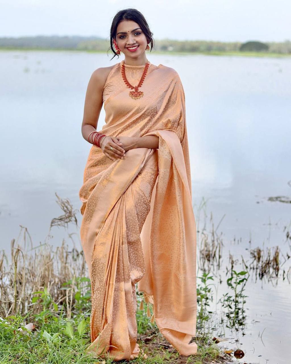 Graceful Beige Color Lightweight Lichi Silk Saree