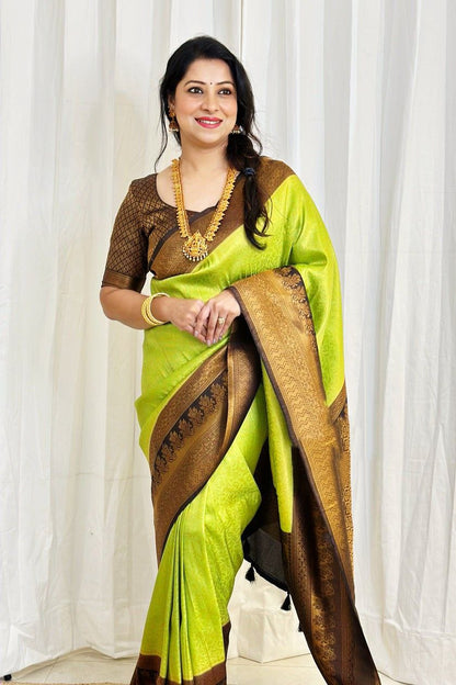 Party Wear Parrot Green Color Soft Silk Coper Jari Design Saree