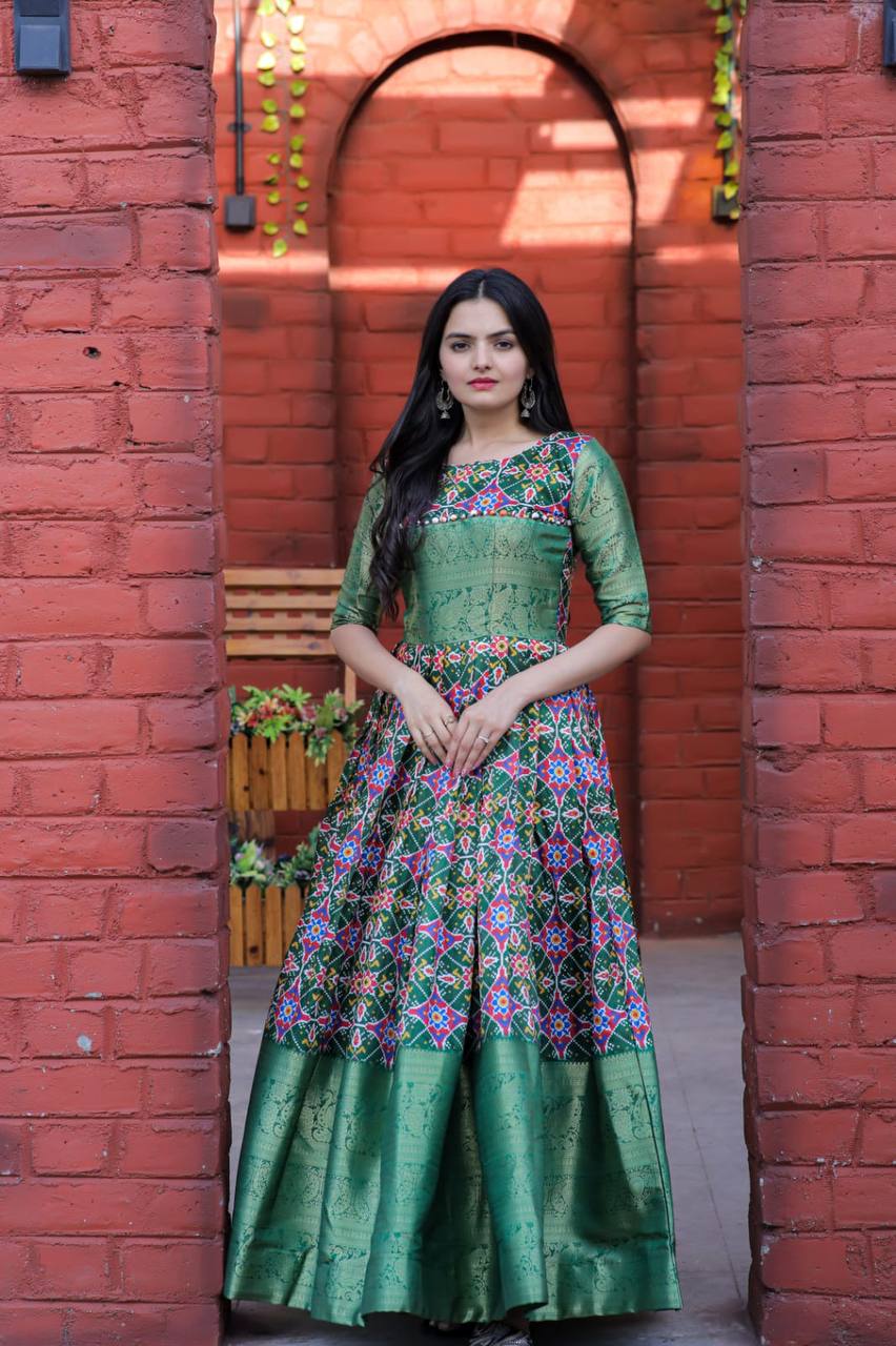 Beautiful Patola Print Green Color Gown