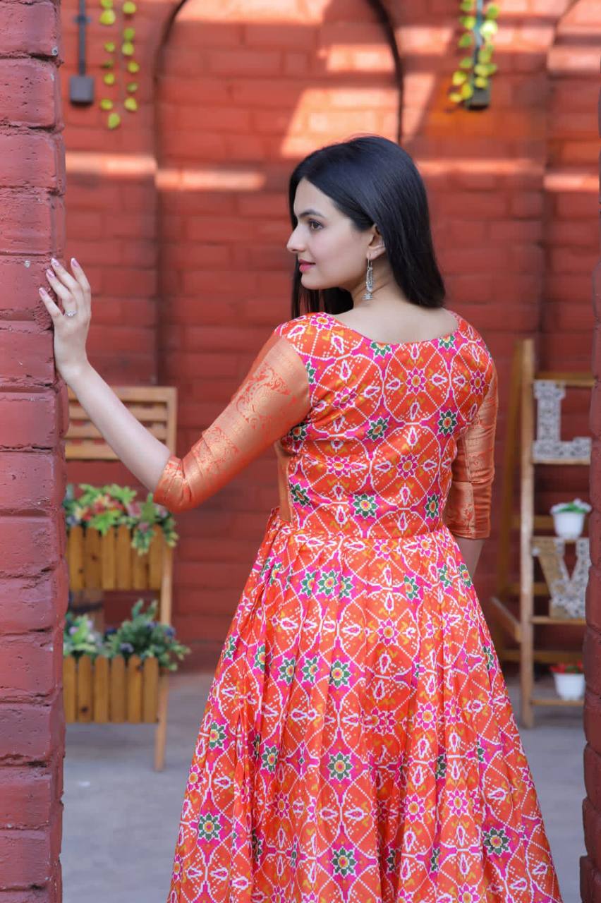 Beautiful Patola Print Orange Color Gown