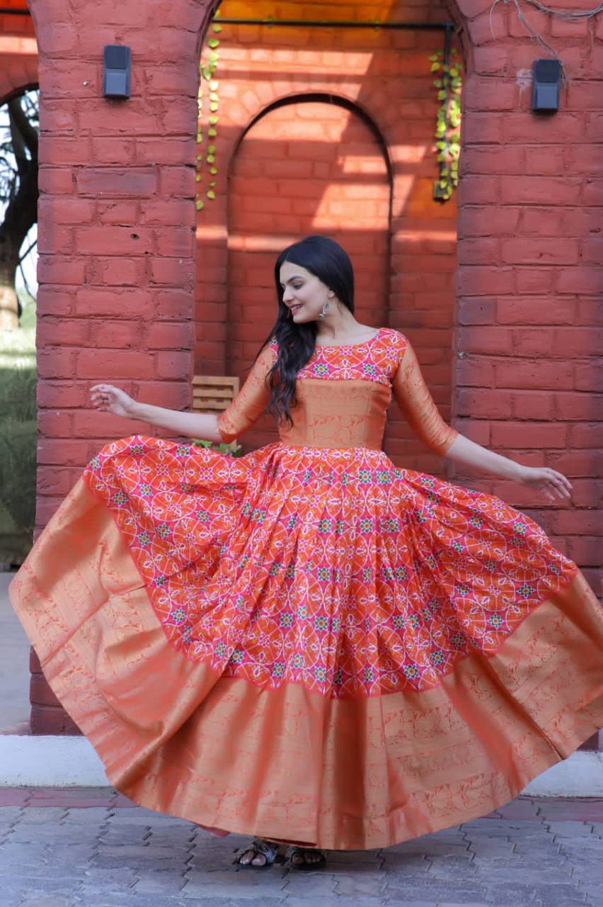 Beautiful Patola Print Orange Color Gown