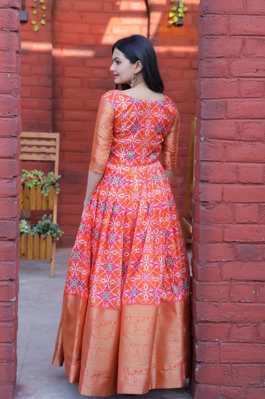 Beautiful Patola Print Orange Color Gown