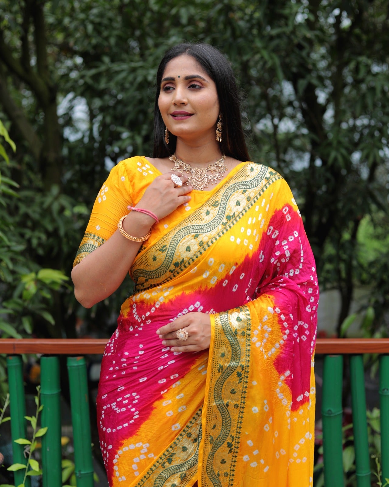 Yellow And Pink Dual Color Bandhej Pallu Saree